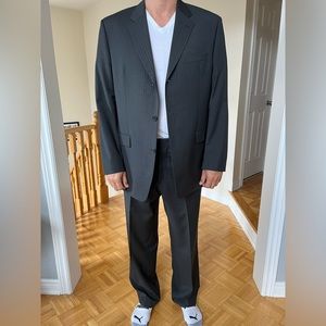 Hugo Boss classic suit. Lightly worn. Purchased in France Paris.